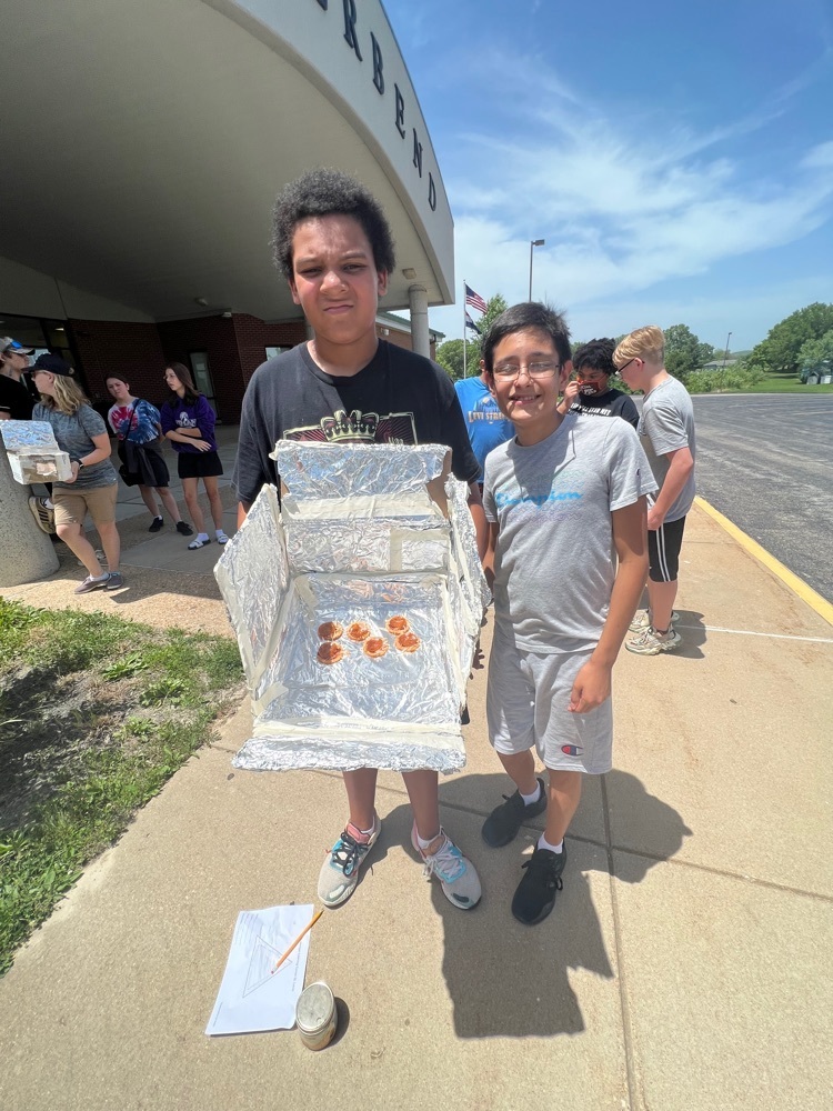 Students made cracker pizzas in their solar ovens. 